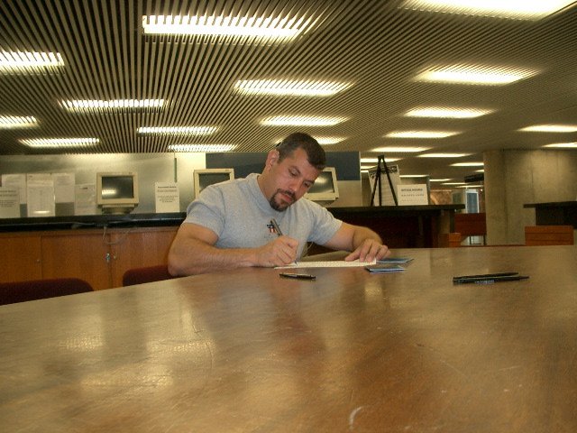 Daniel at Toronto City Hall filling out the marriage license