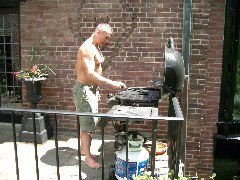 Jay cooking on the grill